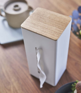 Close up of white Yamazaki Two-Sided Tissue Case on a kitchen table view 4