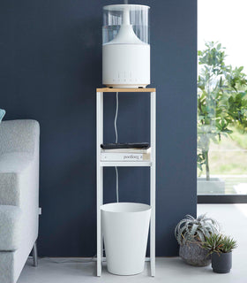 Yamazaki white Pedestal Stand with an air purifier on top and books on the lower shelf view 5