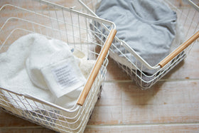 Aerial view of Wire Laundry Basket holding clothes in laundry room.
 view 10