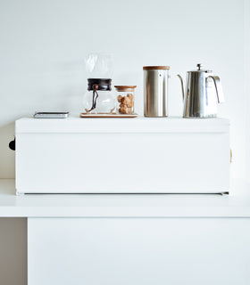 Frontal view of white Yamazaki Home Bread Box - Wide with coffee equipment on top view 4