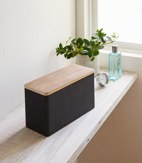 Front view of black Countertop Organizer on shelf by Yamazaki Home. view 9