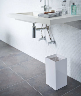 Black Stackable Countertop Shelves stacked together holding coffee brewing accessories on kitchen counter by Yamazaki Home. view 4