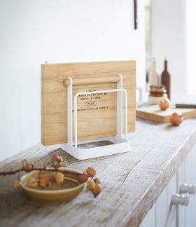 Knife & Cutting Board Stand holding cutting board on shelf by Yamazaki Home. view 5