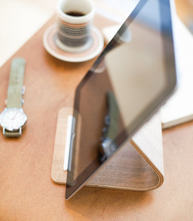 Aerial view of Tablet Stand holding tablet on table by Yamazaki Home. view 4