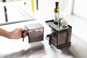 Aerial view of black Pantry Organizer holding spices with uppershelf in kitchen by Yamazaki Home. view 10