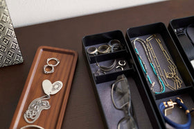 Close up of black Stacking Watch and Accessory Case opened with glasses and jewelry view 16