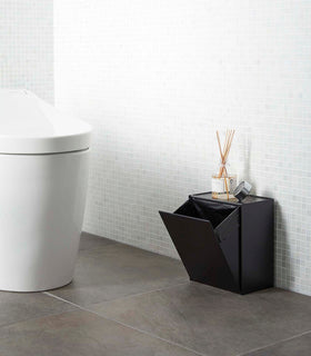 Black Wall-Mount Storage on floor in bathroom by Yamazaki Home. view 11