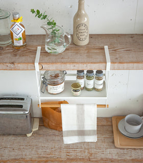 Aerial view of white Undershelf Organizer holding spices in kitchen by Yamazaki Home. view 4