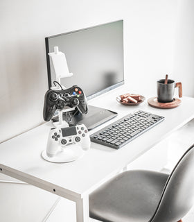 White Controller Stand displaying Xbox controllers on desk by Yamazaki Home. view 5