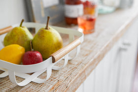 Close up view of white Fruit Bowl displaying fruit by Yamazaki Home. view 4