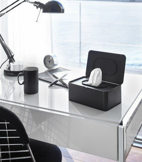 Open black Wet Tissue Case on office desk by Yamazaki Home. view 9