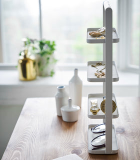 Aerial view of white Adjustable Pot Lid Organizer in kitchen drawer by Yamazaki home. view 5