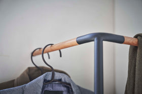 Close up of hanging portion of Yamazaki black Corner Leaning Coat Hanger view 15