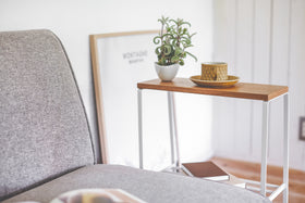 End Table holding cup, plant, and books in living room by Yamazaki Home. view 6