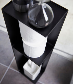  Yamazaki Home black Toilet Organizer holding decor pieces, toilet paper, and toilet brush. view 9