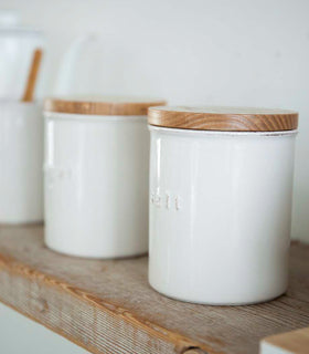 Close upside view of Ceramic Salt Canister on kitchen shelf by Yamazaki Home. view 16