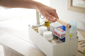 White Storage Caddy holding first aid items by Yamazaki Home. view 7