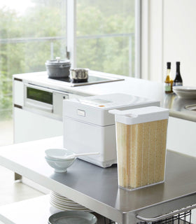 White Storage Container holding rice on kitchen counter by Yamazaki Home. view 2