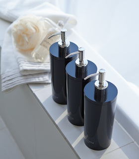 Aerial view of black Body Soap Dispenser on bathtub edge by Yamazaki Home. view 30