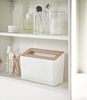 Front view of white Countertop Waste Bin on bathroom shelf by Yamazaki Home. view 3