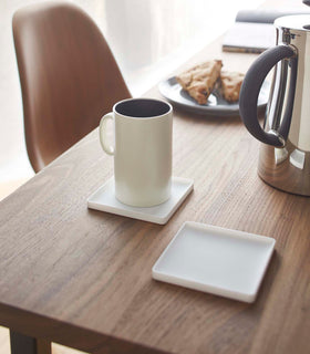 Yamazaki Home white Square Coaster on dining table.
 view 8