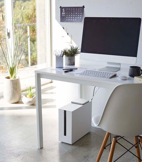 White Rolling Cable Management Rack under desk in office by Yamazaki Home. view 2