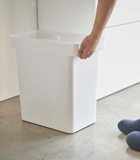 Person grabbing white Airtight Food Storage Container in kitchen by Yamazaki Home. view 6