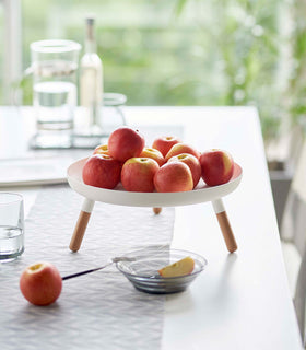 White Yamazaki Countertop Pedestal Tray with apples on top view 4