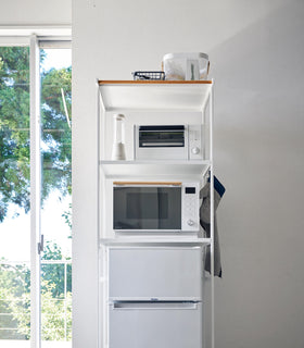 Front view of white Storage Rack holding kitchen appliances by Yamazaki Home. view 36