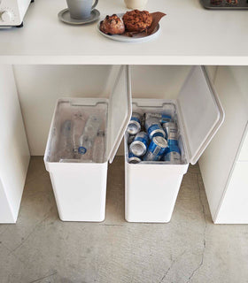 Aerial view of two white Rolling Trash Cans side by side holding recyclables in kitchen by Yamazaki Home. view 5