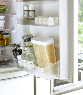 White Storage Container holding rice on kitchen fridge door by Yamazaki Home. view 3