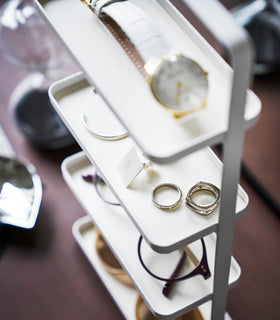 Aerial view of black Adjustable Pot Lid Organizer holding cooking equipment in kitchen drawer by Yamazaki home. view 5