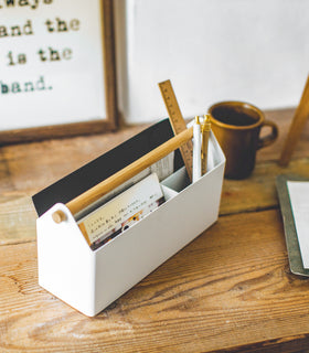 Aerial side view of white Desk Organizer holding writing items by Yamazaki Home. view 13