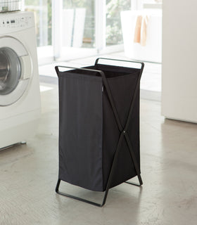 Black Laundry Hamper Storage Organizer in laundry room by Yamazaki Home. view 8