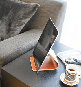 Walnut Tablet Stand holding tablet on living room side table by Yamazaki Home. view 7