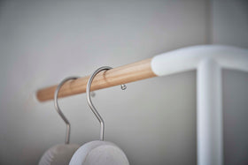 Close up of hanging portion of Yamazaki white Corner Leaning Coat Hanger view 7