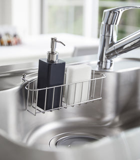 Black Hand Soap Dispenser in kitchen sink by Yamazaki Home. view 8