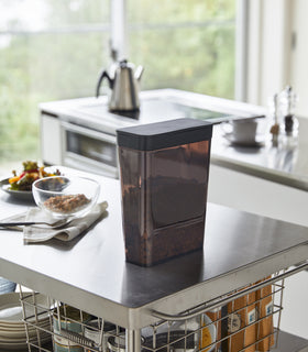 Black Storage Container holding food on kitchen countertop by Yamazaki Home. view 8