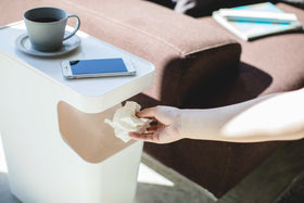 White Side Table Trash Can displaying cup and phone in living room by Yamazaki Home. view 3