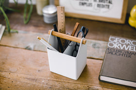 Aerial view of white Pencil Organizer holding glasses, pens, and ruler by Yamazaki Home. view 4