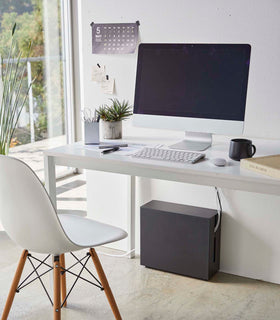 Black Rolling Cable Management Rack under desk in office by Yamazaki Home. view 11