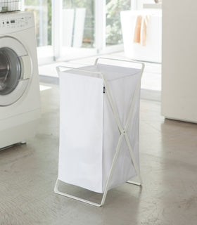 White Laundry Hamper Storage Organizer in laundry room by Yamazaki Home. view 2