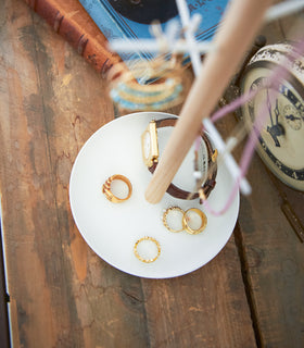 Close up of White Undershelf Hanger holding cookbook by Yamazaki Home. view 7