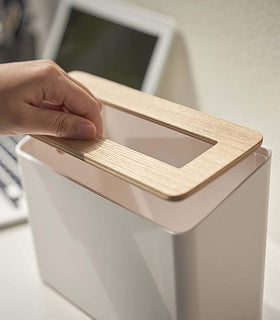 White Countertop Waste Bin with lid being removed by Yamazaki Home. view 5