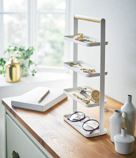 Aerial view of white Adjustable Pot Lid Organizer holding cooking equpiment in kitchen drawer by Yamazaki home. view 3