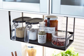 Black Under Shelf Spice Rack displaying ingredients in kitchen by Yamazaki Home. view 8