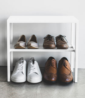 Front view of white Shoe Organizer in entryway by Yamazaki Home. view 7