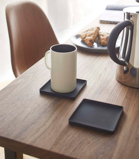 Yamazaki Home Black Square Coaster on dining table.
 view 11