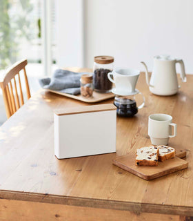 Front view of Coffee Filter Case on dining table by Yamazaki Home. view 3