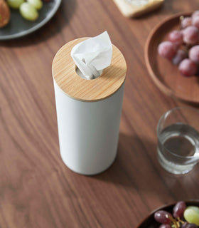 Close up of Large White Yamazaki Home Round Tissue Case on a dining table view 22